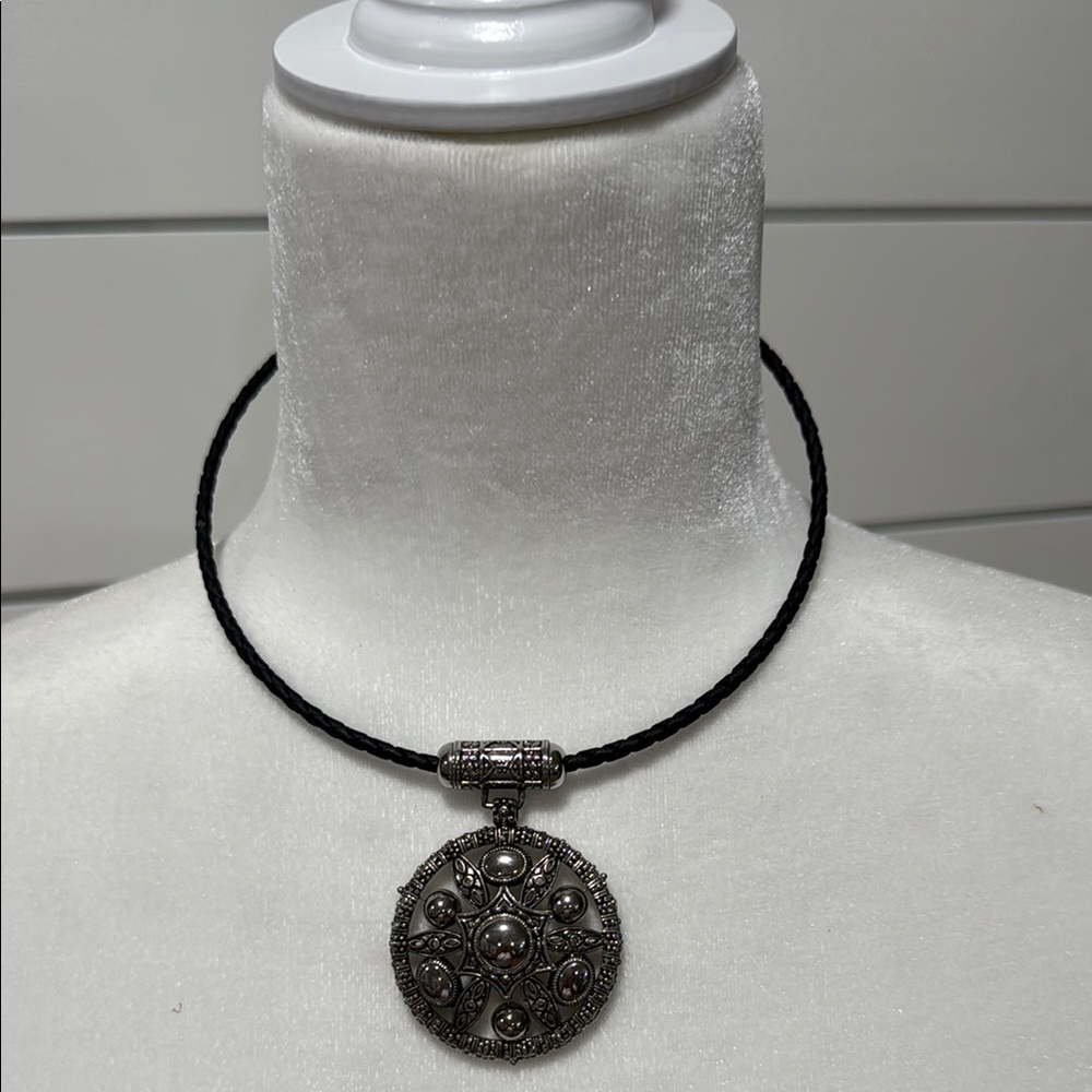 Intricate Silver Pendant Necklace with Black Cord